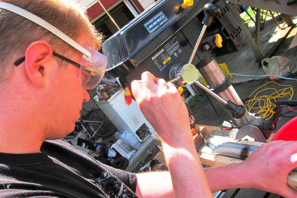 Drilling a hole in steel tubing for a geodesic dome